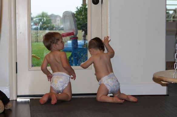 Play time after a bath with twin brother.  Austin and Savanna.