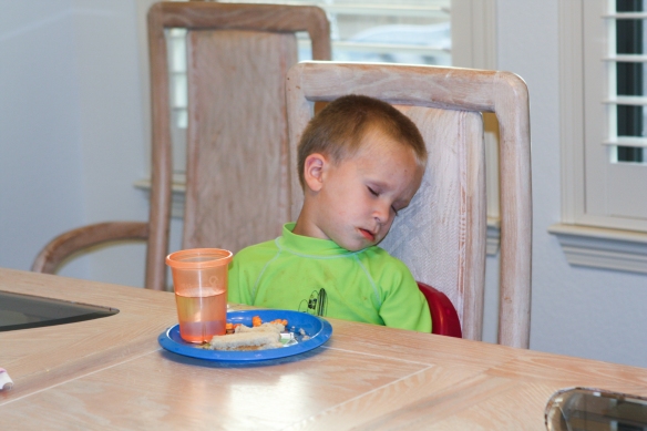 Pre-school and then playing at the splash pad all afternoon is tiring.  This is 6:15 at night, and Brandon falls asleep at the table.
