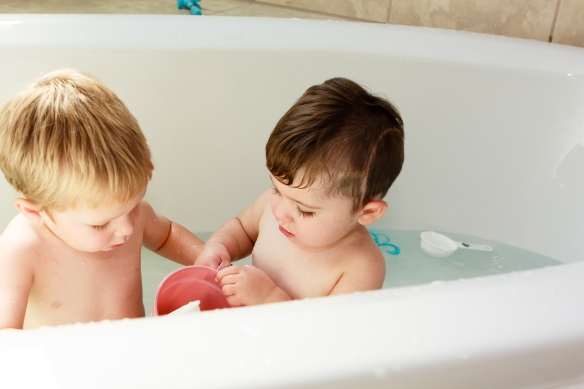 In the tub fun, without the big kids.  A rare moment worthy of a photograph for memory.